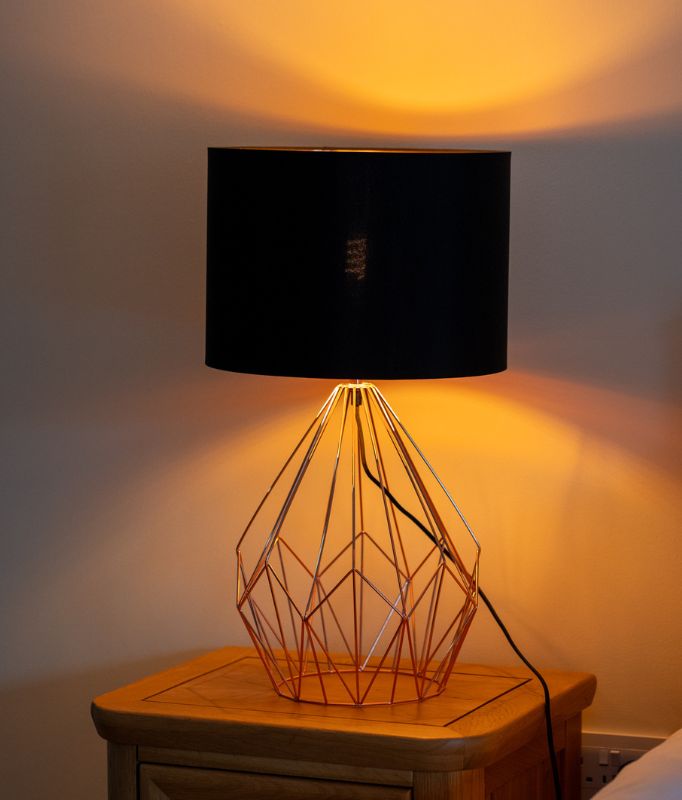 Photo of a contemporary table lamp in one of the luxury suites at Sleeping Giant